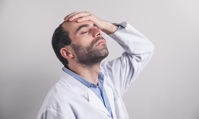 Wall Mural - Caucasian depressed doctor in clinic.