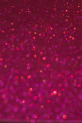 Wall Mural - Abstract pink glitter blur background. Defocus dark background for Valentine's day.