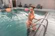 © Yakobchuk Olena - Beautiful sexy woman walking out of swimming pool