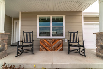 Two rocking chairs on a covered patio