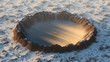 Crater on the ground covered in snow