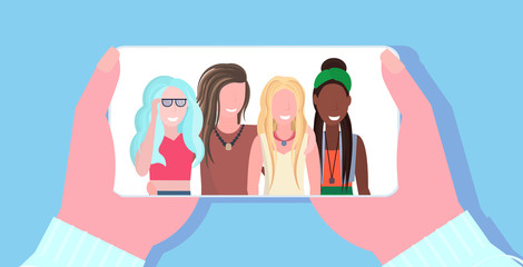 Poster - human hands using smartphone mix race people chatting over video call online mobile application web chat meeting social media communication concept portrait horizontal vector illustration