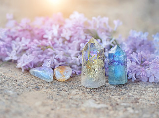 fluorite, citrine, quartz and lilac flower. gemstones crystal minerals for relaxation and meditation
