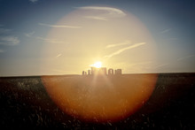 Stonehenge, UK At Sunset With Lens Flare