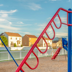 Wall Mural - Square frame Fun playground for children with colorful slides swings and climbing bars