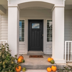 Wall Mural - Square frame Pumpkins decorating a pathway to a house