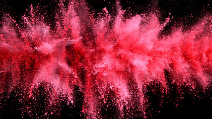 Wall Mural - Explosion of pink powder isolated on black background