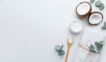 Wall Mural - spa set of coconut cream, salt as body scrub and white towel