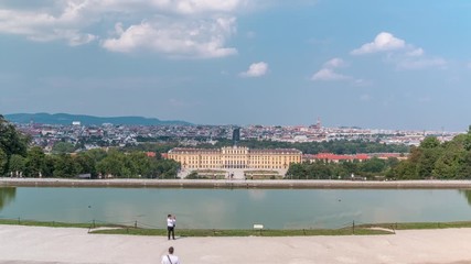 Sticker - Beautiful view of famous Schonbrunn Palace timelapse with Great Parterre garden and lake in Vienna, Austria. City panorama on a background