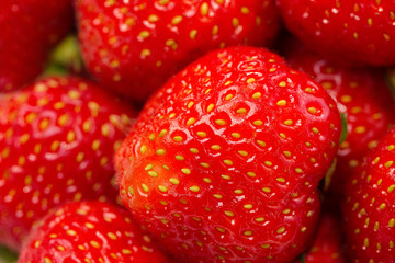 Ripe strawberry berry close up. Background, texture