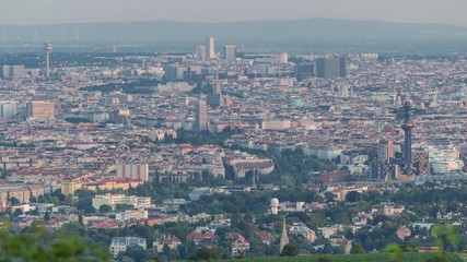 Poster - Skyline of Vienna from Danube Viewpoint Leopoldsberg aerial timelapse. Downtown, skyscrapers and historic buildings at evening before sunset