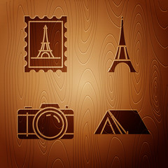 Sticker - Set Tourist tent, Postal stamp and Eiffel tower, Photo camera and Eiffel tower on wooden background. Vector