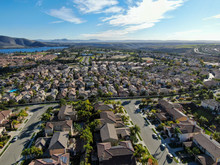 Aerial View Of Upper Middle Class Neighborhood With Identical Residential Subdivision Houses During Sunny Day In Chula Vista, California, USA.