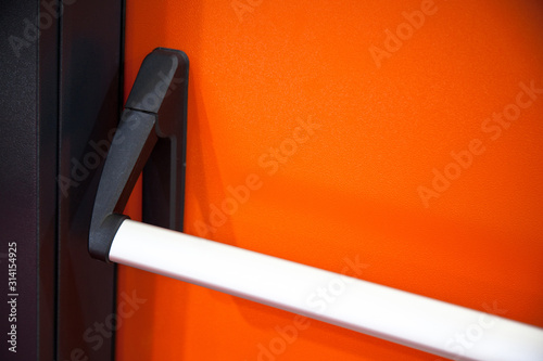 Fotomural Emergency exit door. Push bar and rail for panic exit