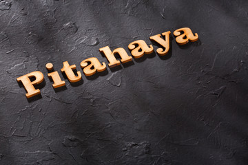 Wall Mural - Pitahaya word in wooden letters - Selenicereus megalanthus