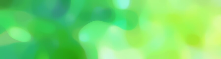 Poster - soft unfocused horizontal background graphic with medium sea green, pale green and light green colors space for text or image