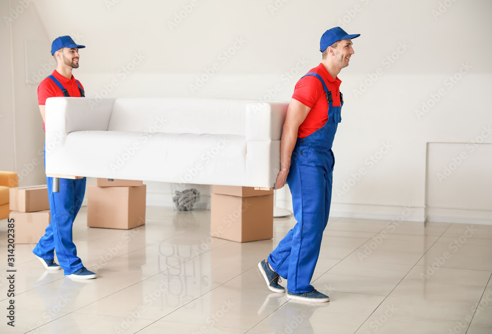 Loaders carrying furniture on moving day