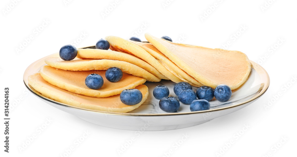 Plate with tasty pancakes and blueberry on white background