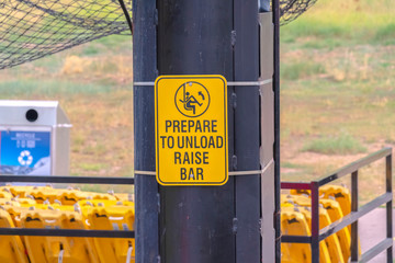 Wall Mural - Safety sign on a chairlift in Park City Utah viewed on a sunny summer day