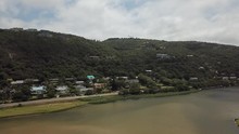 4K Summer Morning Aerial Drone Video: Wilderness White Sand Beach, Touw River Estuary, Residential Buildings. Wilderness Is A Small Holiday Resort In Garden Route, Western Cape, South Africa