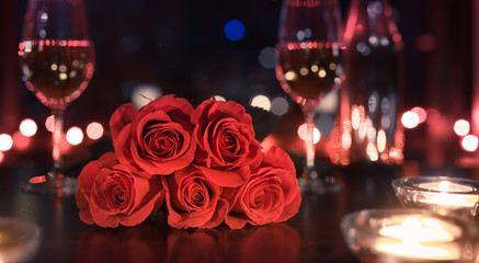 Wall Mural - Gift of red roses and candle light dinner. Dinner date night and Valentines Day concept. 