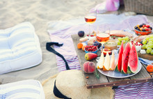 Picnic On The Beach At Sunset In The Style Of Boho