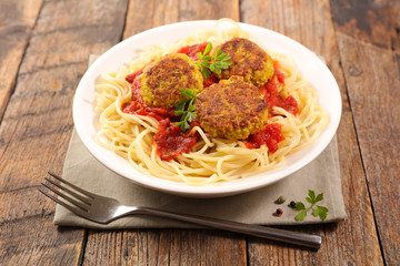 spaghetti with tomato sauce and zucchini ball