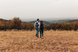 © Zoran Zeremski - Young couple enjoying hiking together in nature.
