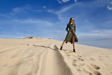 woman in the desert on the sand