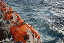 Lifeboats On A Cruise Ship At Sea