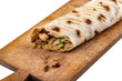 Doner Kebab Gyros Shawarma beef or chiken roll in pitta bread  sandwich on wooden desk