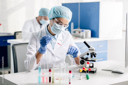 Cuadros en Lienzo selective focus of genetic consultant doing dna test in lab