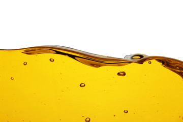 Wall Mural - Cooking oil flow isolated on white. Color liquid