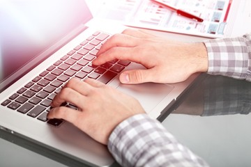 Wall Mural - Business people working on a laptop in an office