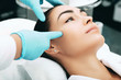 © Peakstock - woman rejuvenates face using cosmetic procedures. Facial injections make the skin smooth and young