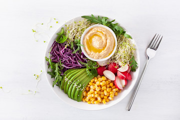 Canvas Print - vegan avocado sweet corn lunch bowl with hummus, red cabbage, radish and sprouts