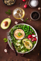 Wall Mural - healthy vegan lunch bowl with avocaco cucumber hummus peas radish