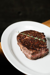 Wall Mural -  Cooked steak on a plate