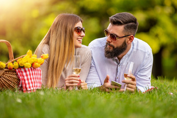 Wall Mural - Happy young couple enjoying on vacation