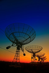 Wall Mural - the silhouette of a radio telescope observatory