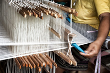 Weave Silk Cotton On The Manual Wood Loom ,Thailand,selective Focus,vintage Color	
