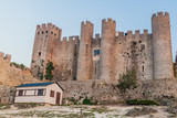 Fototapeta Uliczki - Medieval castle in Obidos village, Portugal