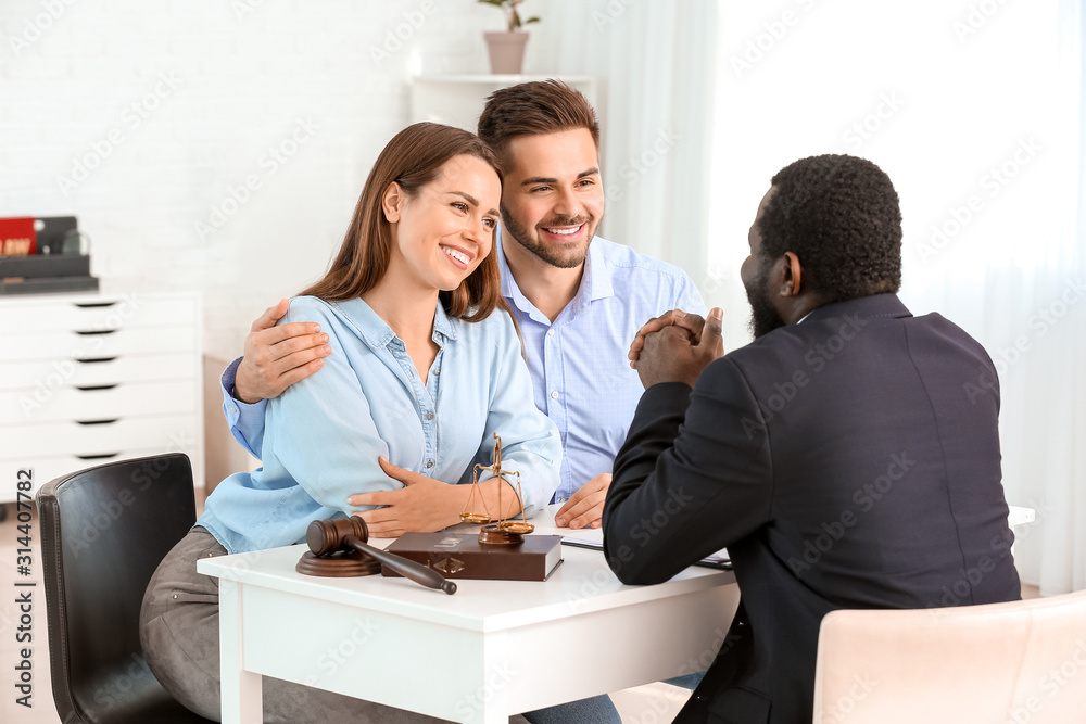 Couple visiting lawyer in office