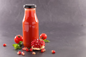 Canvas Print - pomegranate juice in a bottle