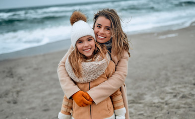 Family on the beach near the sea