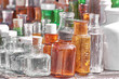 © Sergey Privalov - Collection of glass multi-colored vintage perfume bottles.