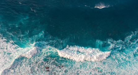 Wall Mural - aerial view to waves in ocean