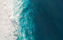 Aerial View To Waves In Ocean Splashing Waves.