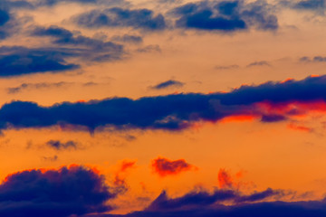 Wall Mural - orange sunset sky with clouds. beautiful nature background