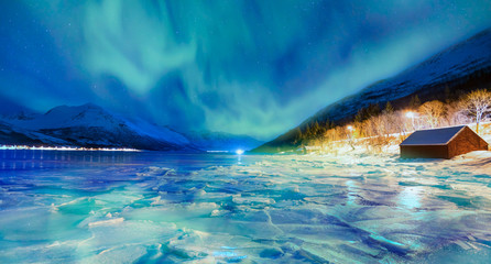 Wall Mural - northern lights (aurora borealis) in the sky over tromso, norway